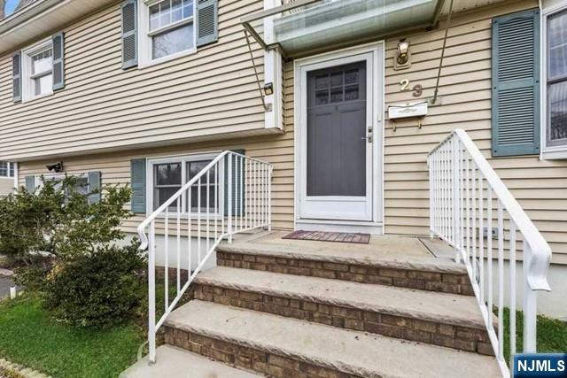 23 Asmus Road Closter, NJ 07624 - Photo 2 of 38 a white house with a outdoor space