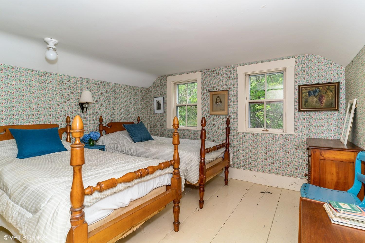 35 Mill Hill Road Wellfleet, MA 02667 - Photo 16 of 25 a bed room with furniture and a window