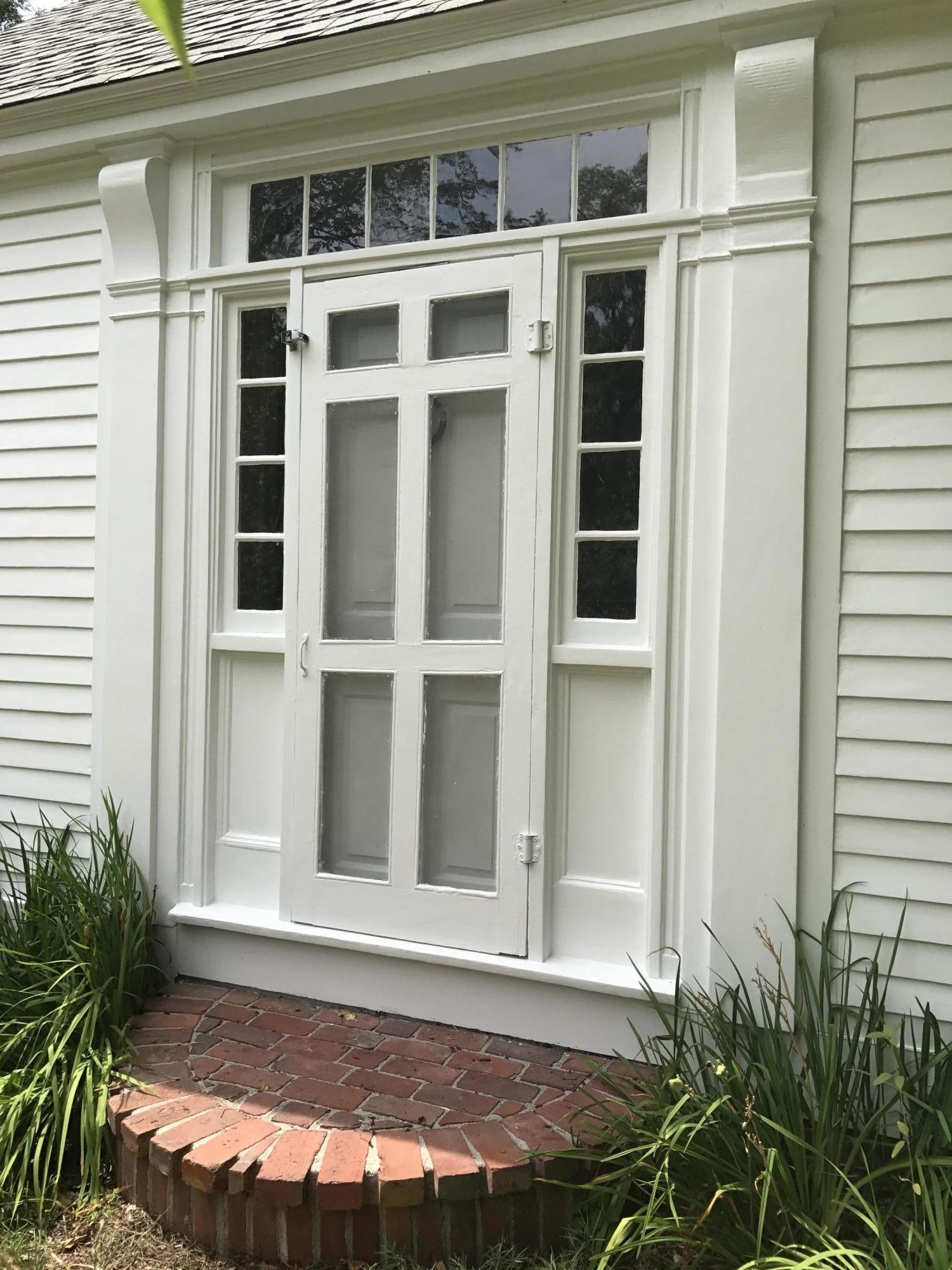 35 Mill Hill Road Wellfleet, MA 02667 - Photo 4 of 25 a view of house exterior with chair and door