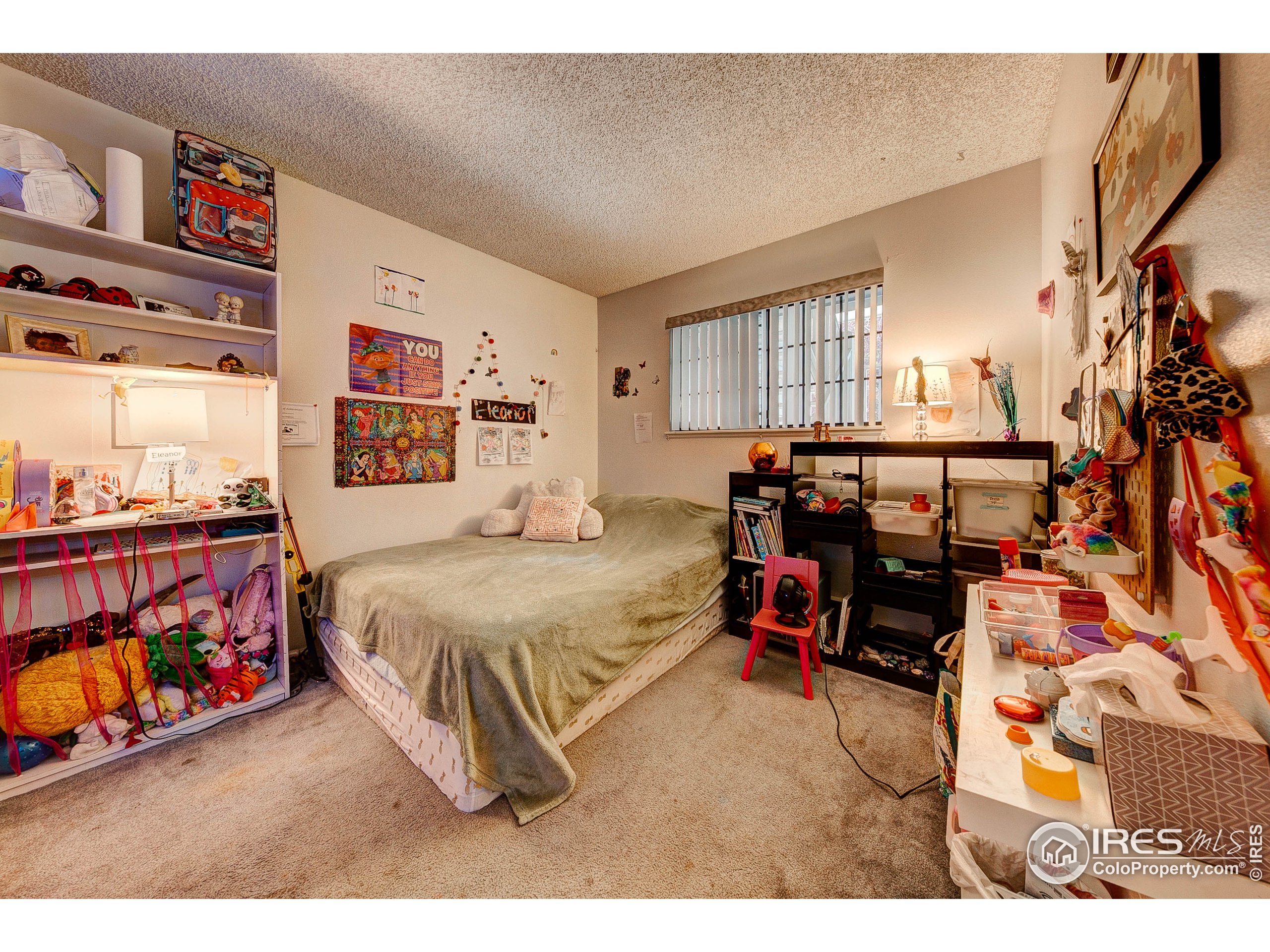 1640 Kirkwood Drive, Unit 2022 Fort Collins, CO 80525 - Photo 14 of 20 a bedroom with bed and window