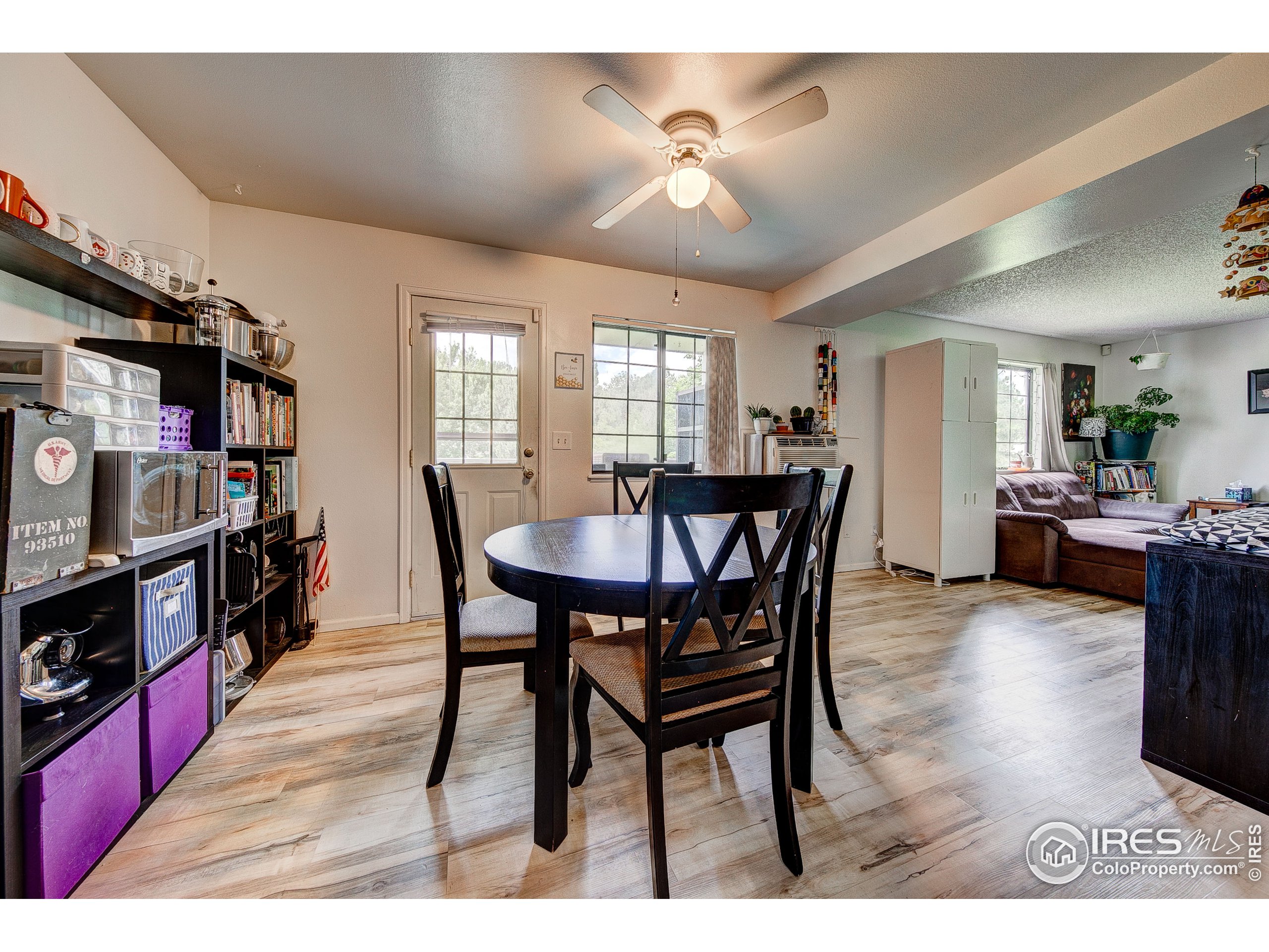1640 Kirkwood Drive, Unit 2022 Fort Collins, CO 80525 - Photo 10 of 20 a view of a dining room with furniture