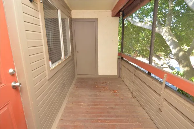 a kitchen with granite countertop a sink stove and refrigerator