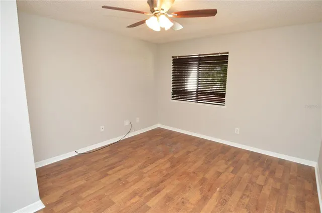 an aerial view of a house with outdoor space pool seating area and yard