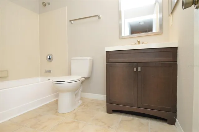 a view of a lobby with furniture and floor to ceiling window