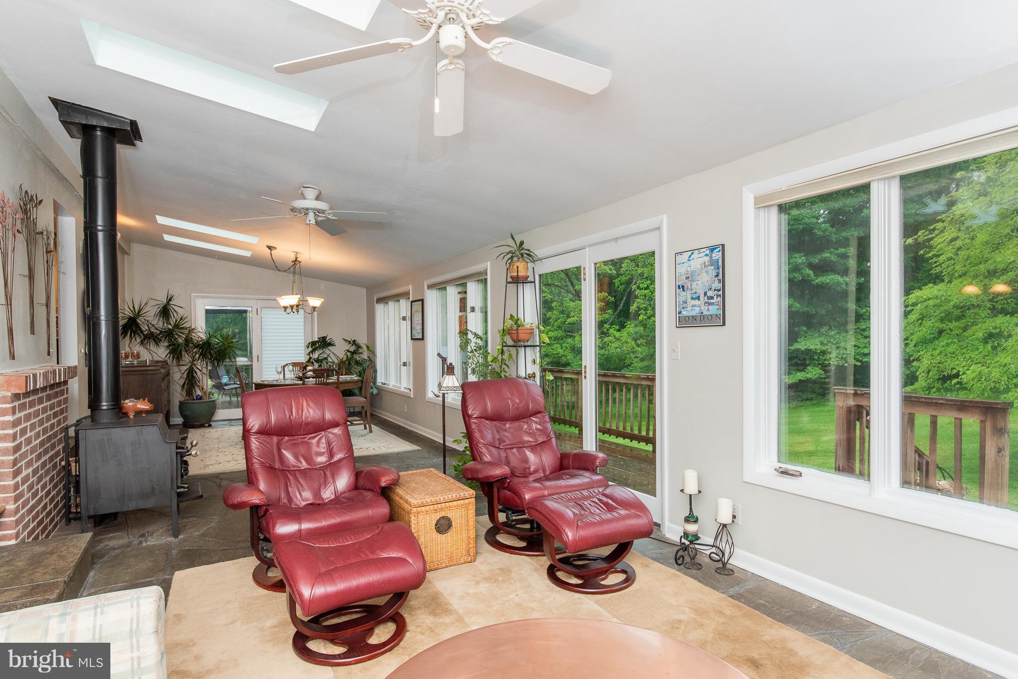 1030 Cockeys Mill Road Reisterstown, MD 21136 - Photo 5 of 29 Sun Room with wood burning stove