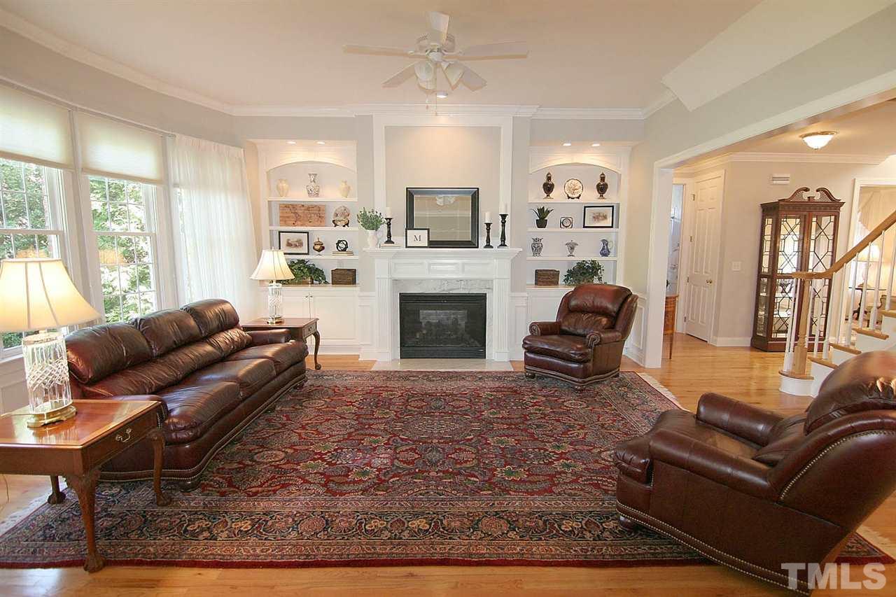 11833 Lowery Ridge Drive Raleigh, NC 27614 - Photo 10 of 25 Spacious Family Room lends perfectly to a large family or entertaining friends. Flooring is in meticulous condition. Gas fireplace.