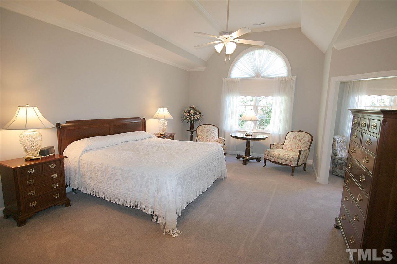 11833 Lowery Ridge Drive Raleigh, NC 27614 - Photo 14 of 25 Custom Extended Master Suite. Attached to the Bedroom and Bathroom is a sitting room overlooking the backyard and a separate room with door (perfect for exercise rm/ nursery/ office) overlooking the front of the home.