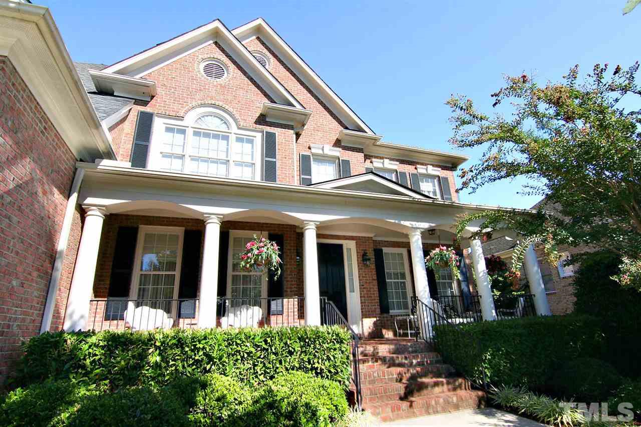 11833 Lowery Ridge Drive Raleigh, NC 27614 - Photo 3 of 25 Owners upgraded the front porch to fully brick and extended it the length of the home. Professionally landscaped and tiered front yard.