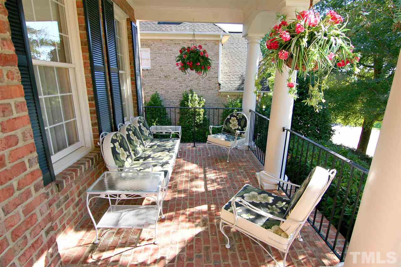 11833 Lowery Ridge Drive Raleigh, NC 27614 - Photo 4 of 25 Custom upgraded brick porch extends the length of the home. Owners also added width to the patio making it truly a place to enjoy with friends and family.