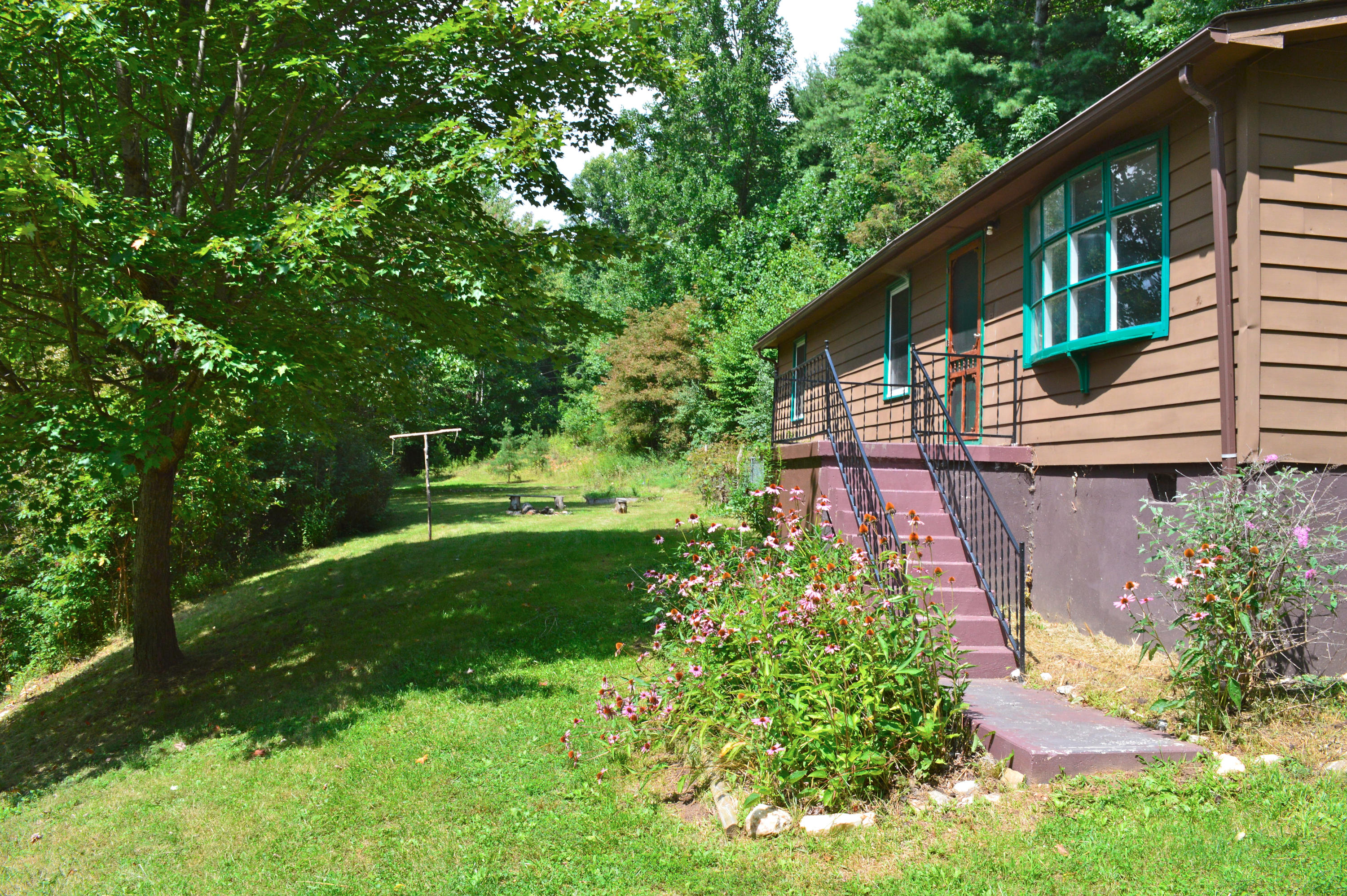 5075 Alum Ridge Road Northwest Riner, VA 24149 - Photo 2 of 28 a view of a house with a yard