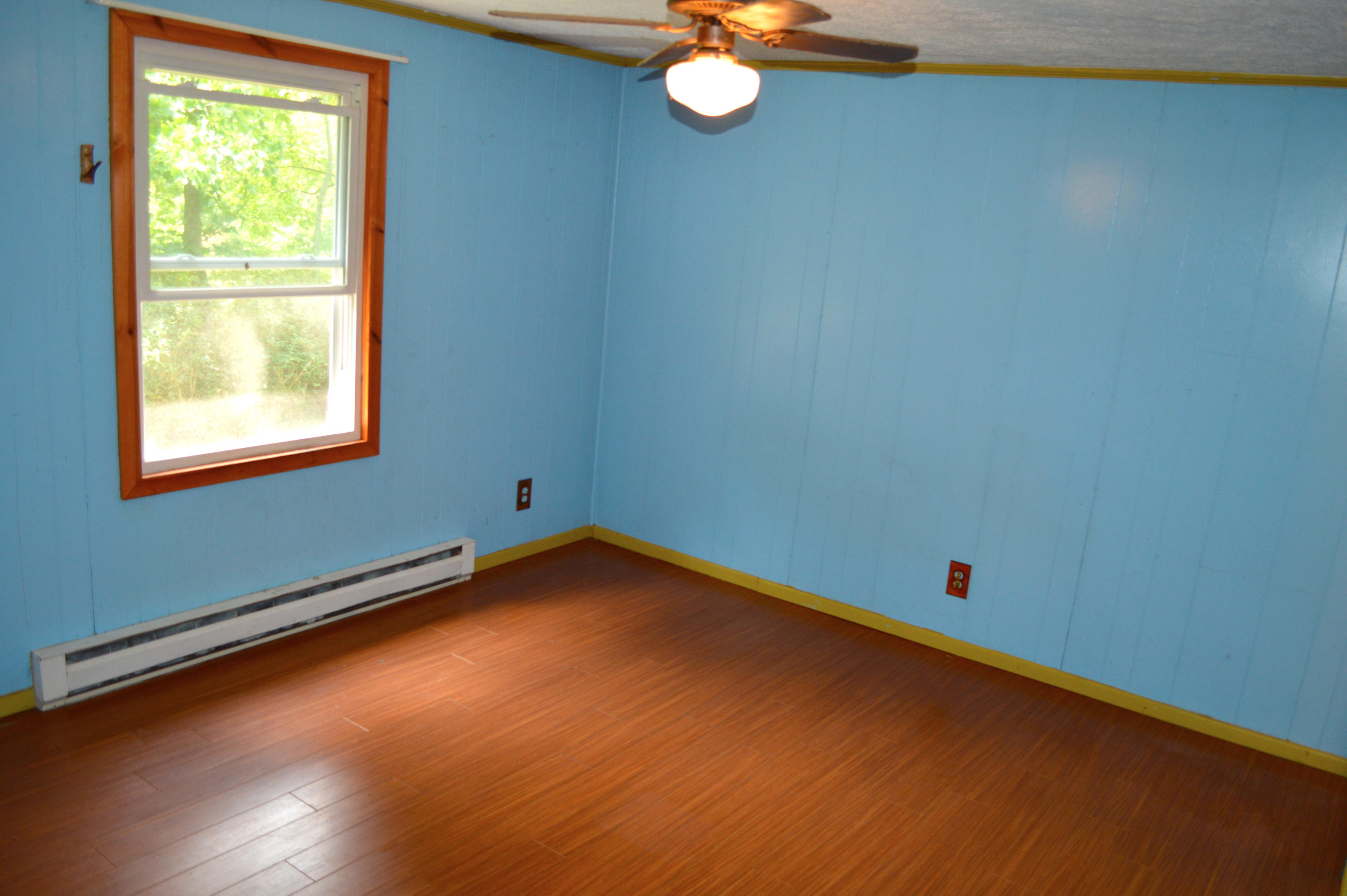 5075 Alum Ridge Road Northwest Riner, VA 24149 - Photo 13 of 28 an empty room with a window