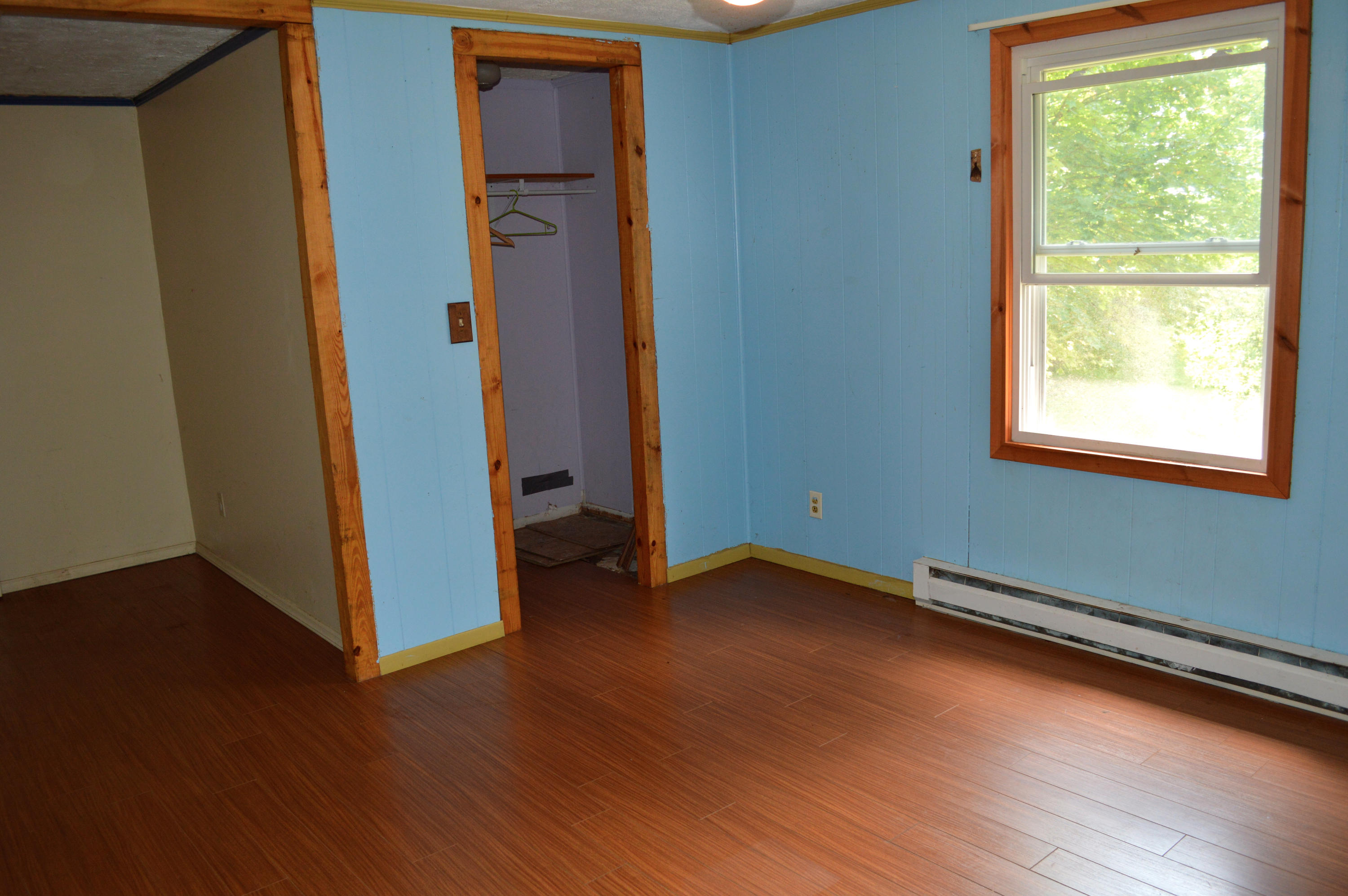 5075 Alum Ridge Road Northwest Riner, VA 24149 - Photo 14 of 28 a view of a room with wooden floor and windows