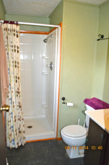 5075 Alum Ridge Road Northwest Riner, VA 24149 - Photo 15 of 28 a bathroom with a shower and a toilet