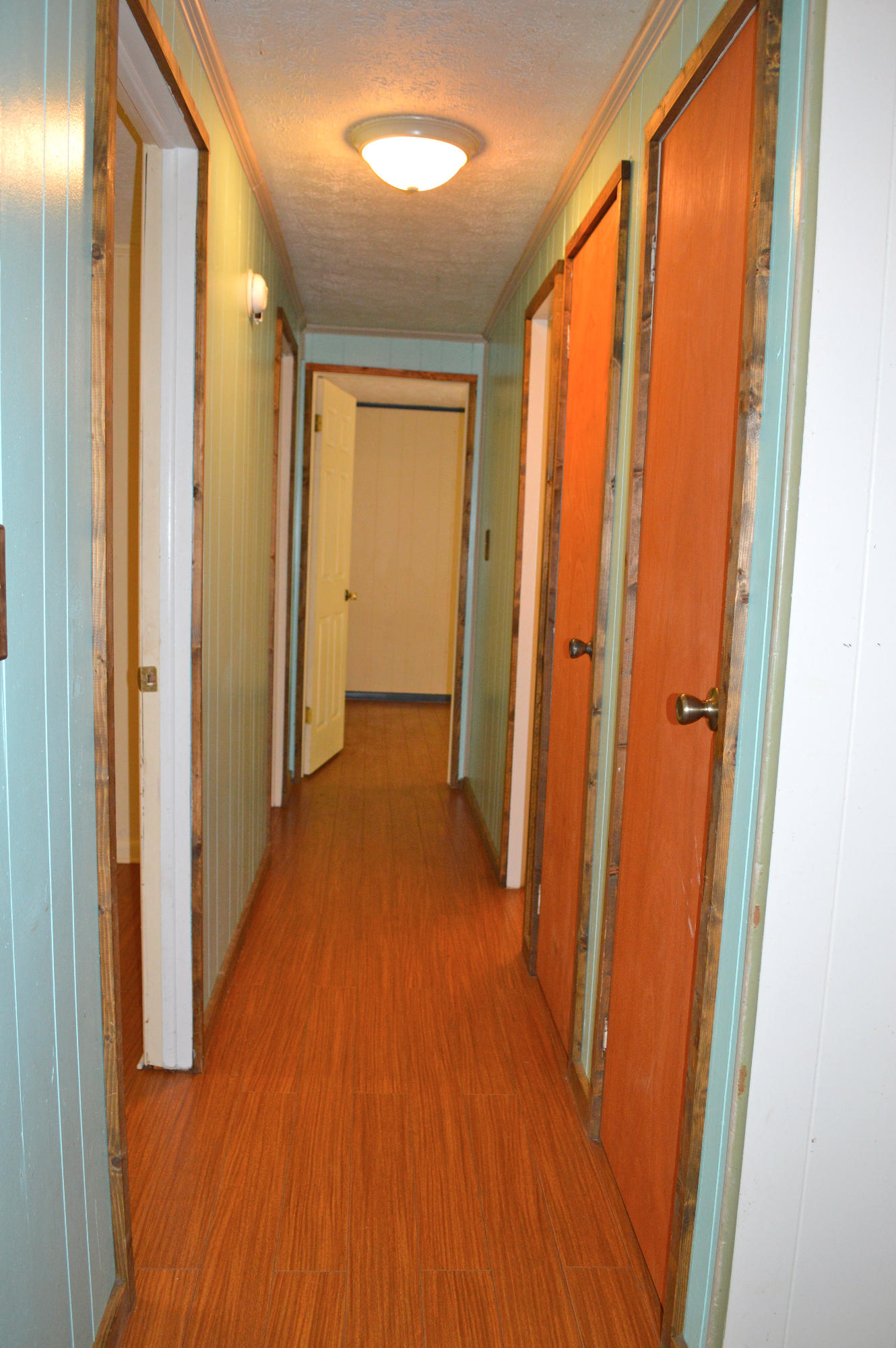 5075 Alum Ridge Road Northwest Riner, VA 24149 - Photo 10 of 28 a view of a hallway with wooden floor