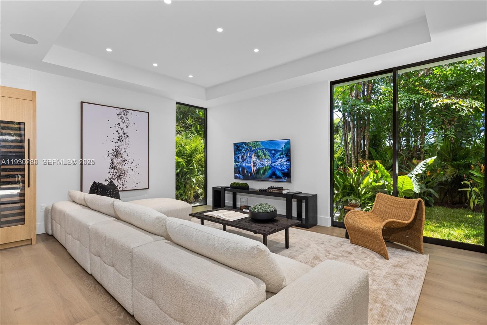 4024 Bonita Avenue Miami, FL 33133 - Photo 27 of 99 a living room with furniture a large window