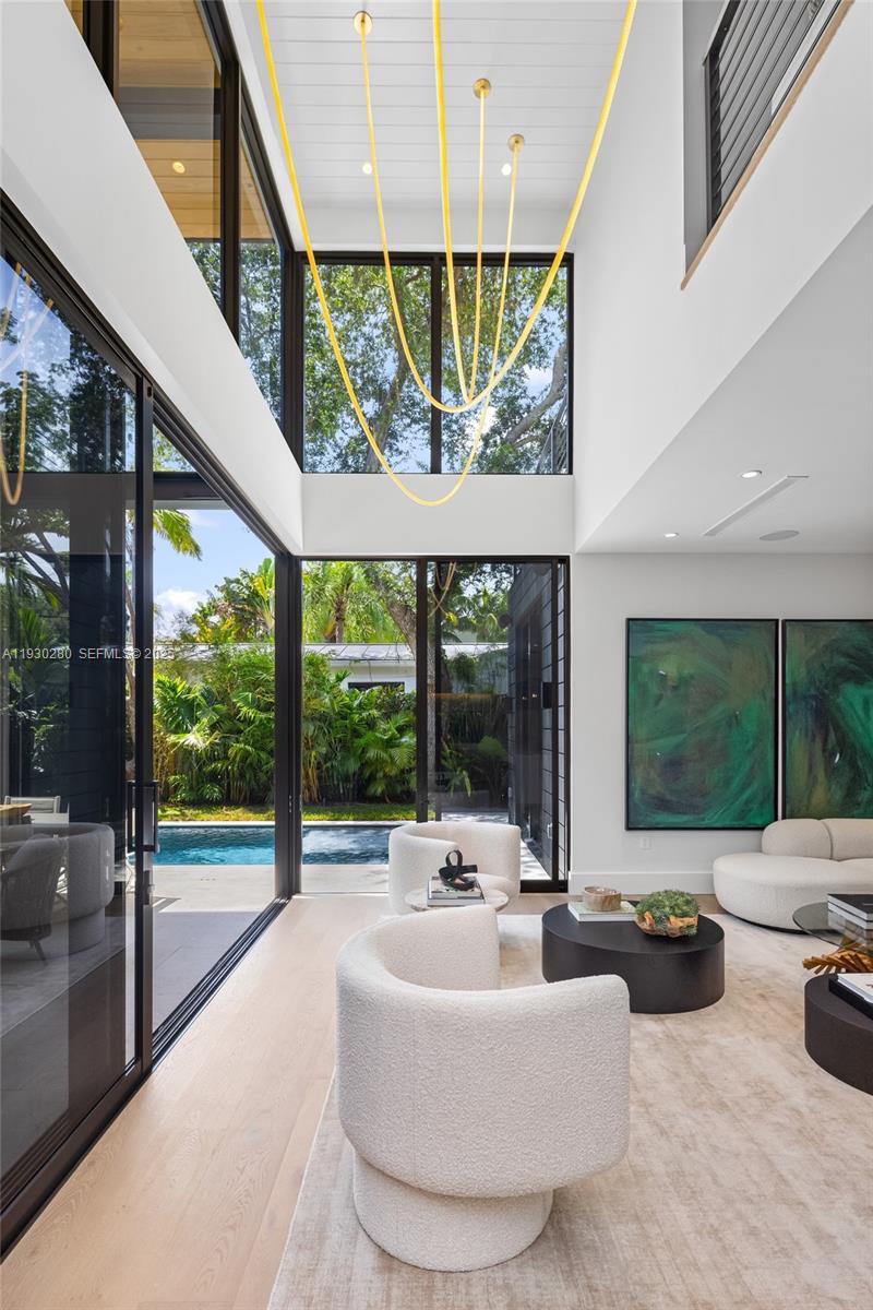 4024 Bonita Avenue Miami, FL 33133 - Photo 30 of 99 a living room with furniture and a large window