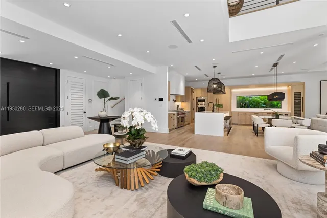 a outdoor space with patio the couches and a dining table with the view of the balcony