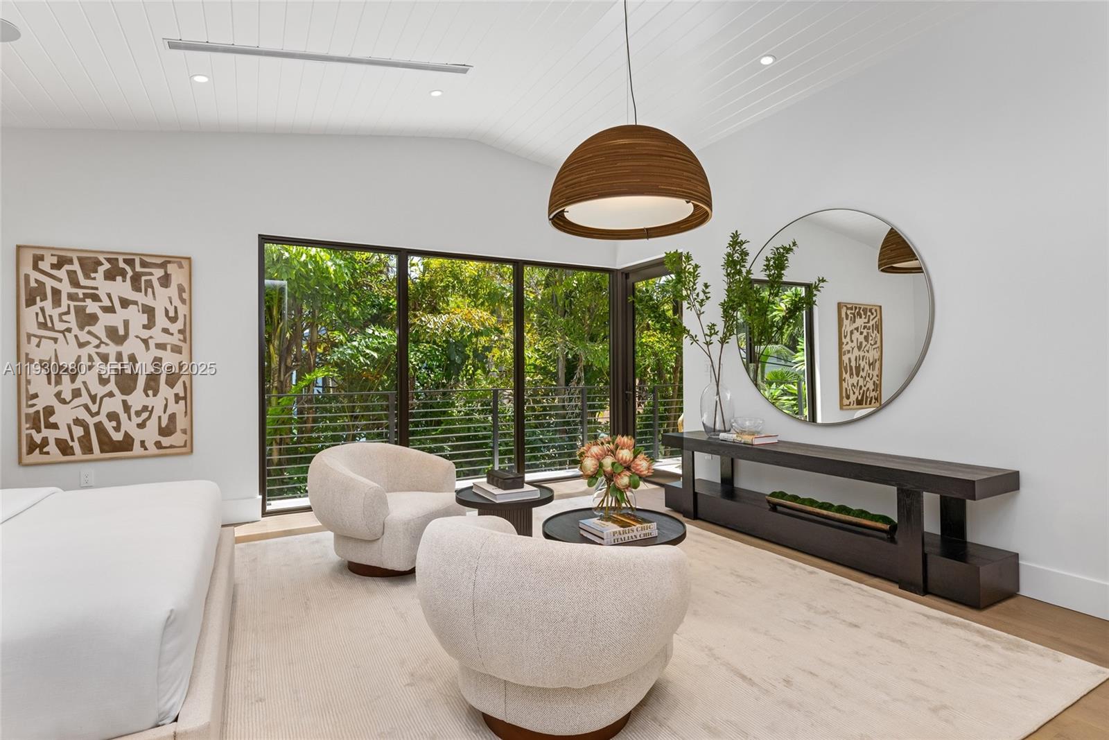 4024 Bonita Avenue Miami, FL 33133 - Photo 47 of 99 a living room with furniture and a large window