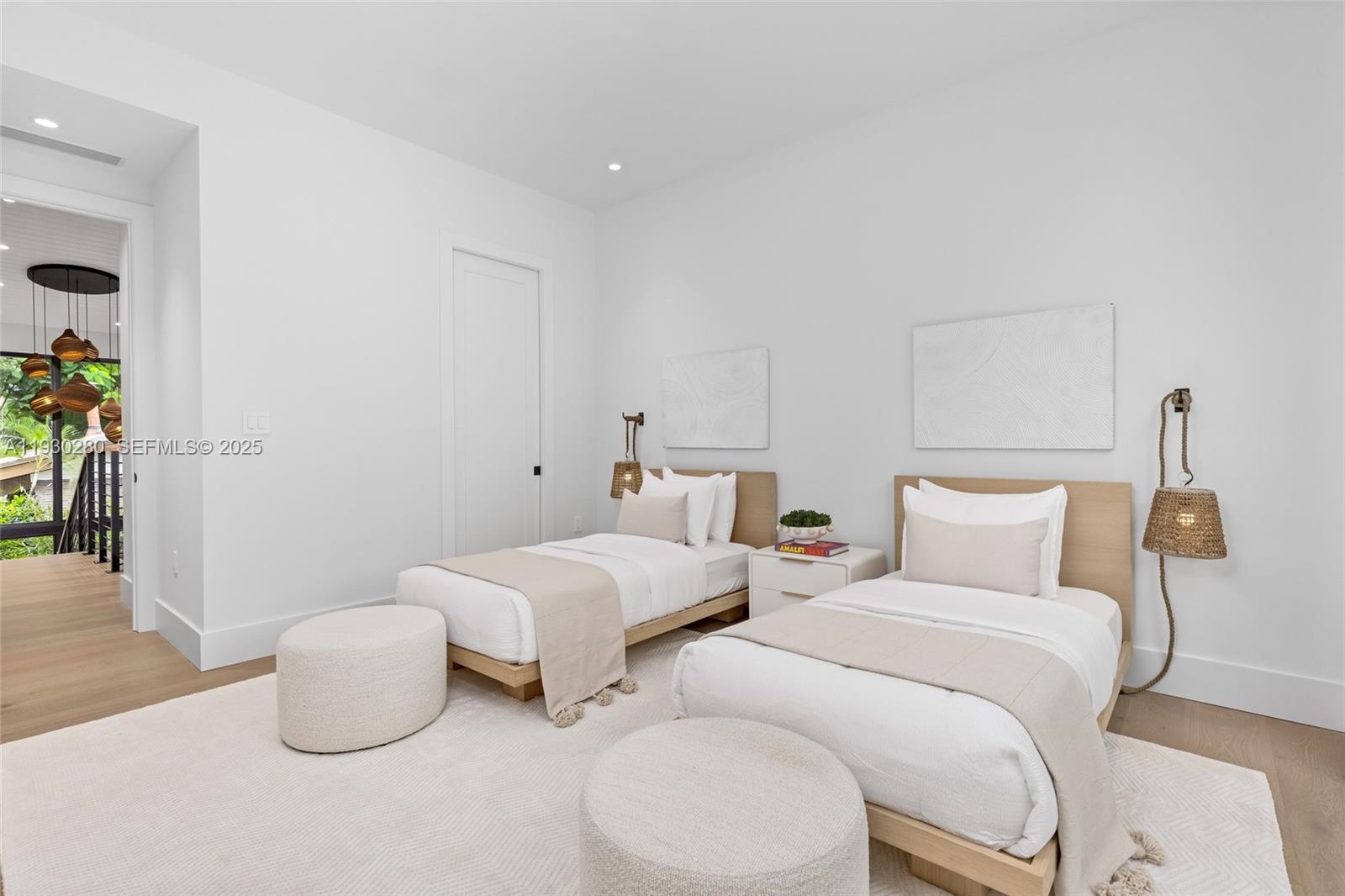 4024 Bonita Avenue Miami, FL 33133 - Photo 63 of 99 a bedroom with two beds and painted walls