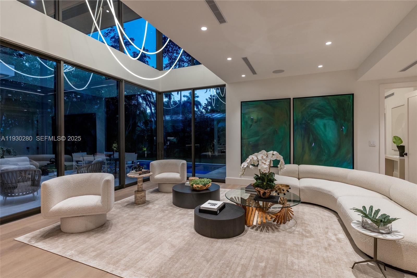 4024 Bonita Avenue Miami, FL 33133 - Photo 97 of 99 a living room with furniture potted plant and a large window