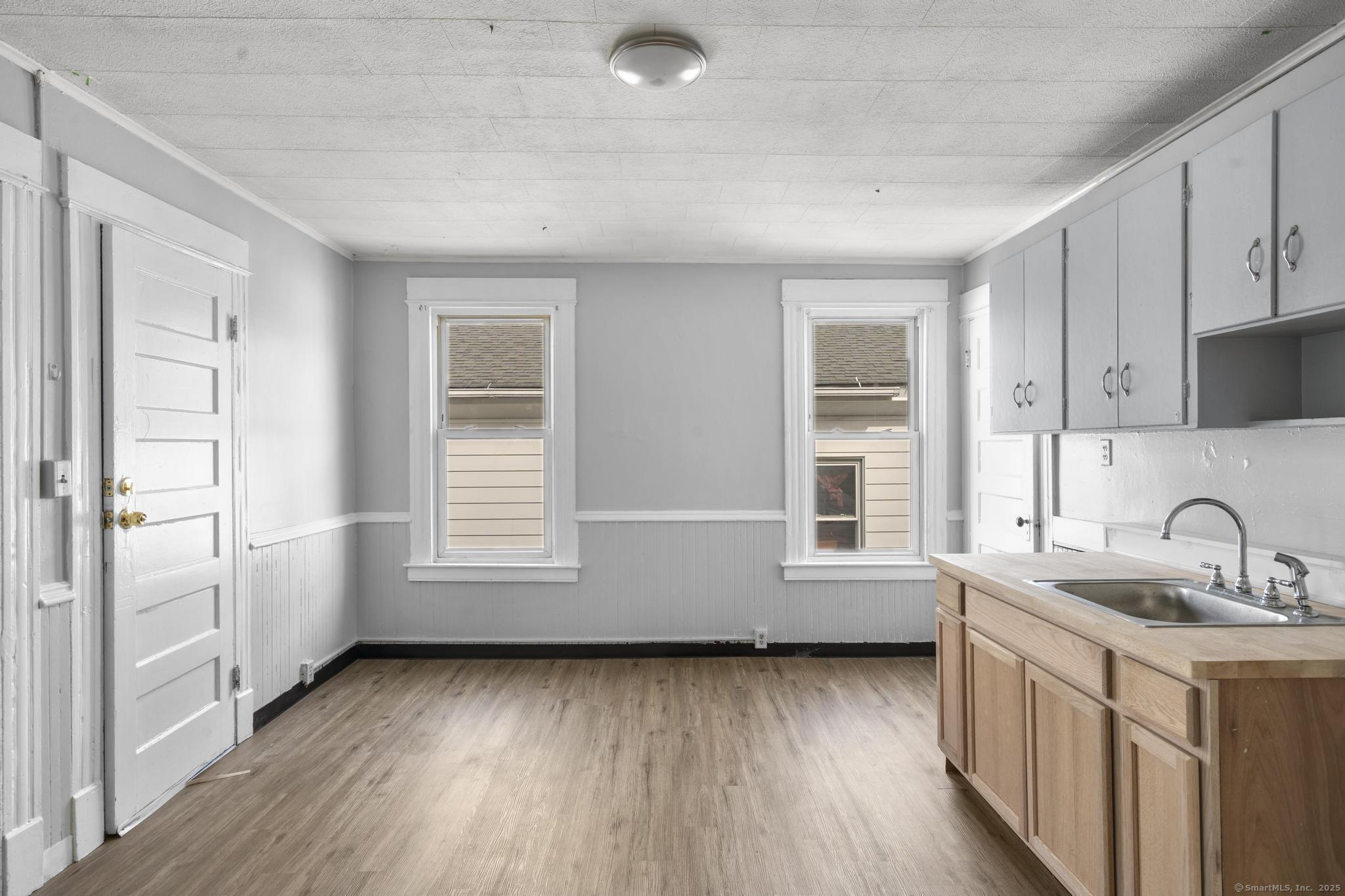 73 South Street Waterbury, CT 06706 - Photo 3 of 29 a view of a kitchen sink and windows