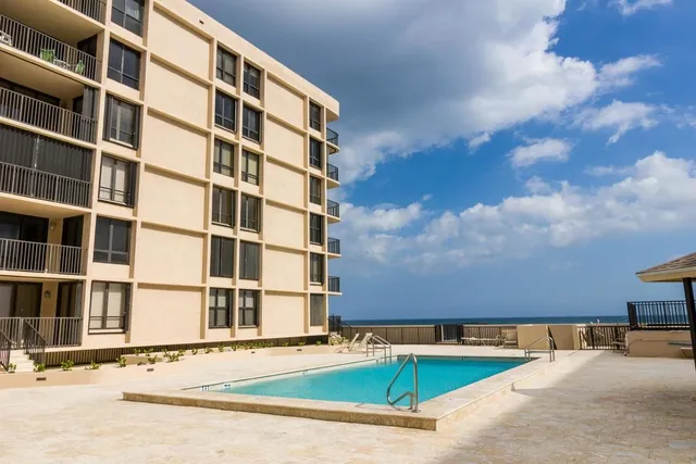 a view of a terrace with chairs