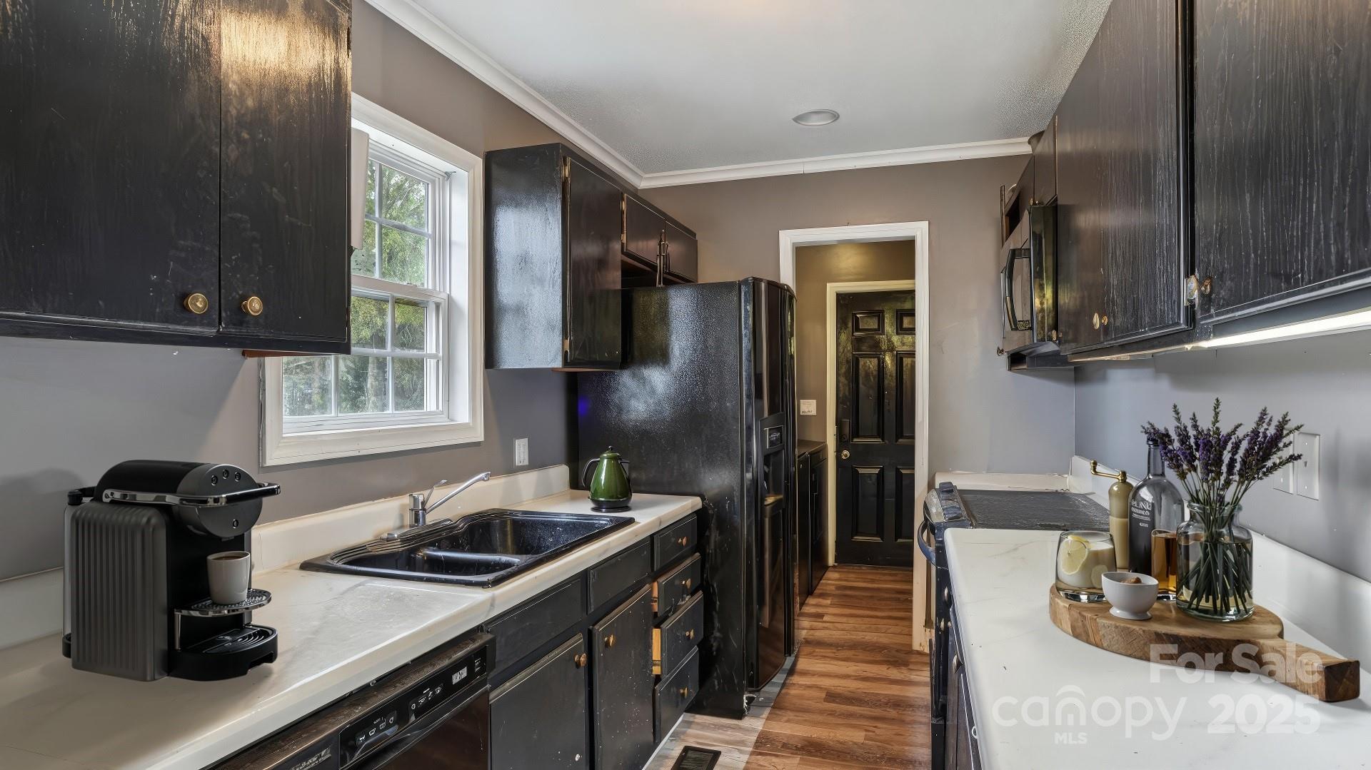 106 Williams Road Kings Mountain, NC 28086 - Photo 5 of 16 a kitchen with a stove and a refrigerator