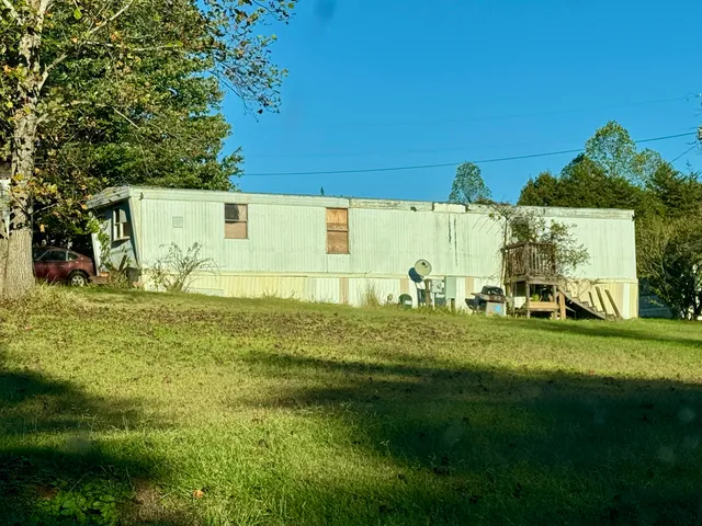 a view of a yard with an trees
