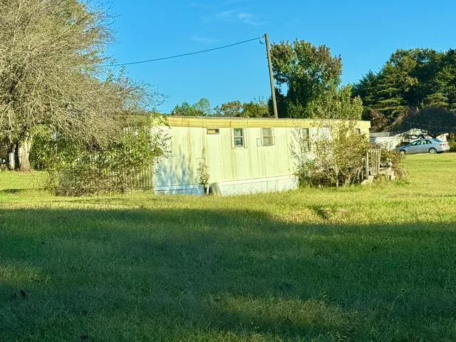 a view of an house with a park