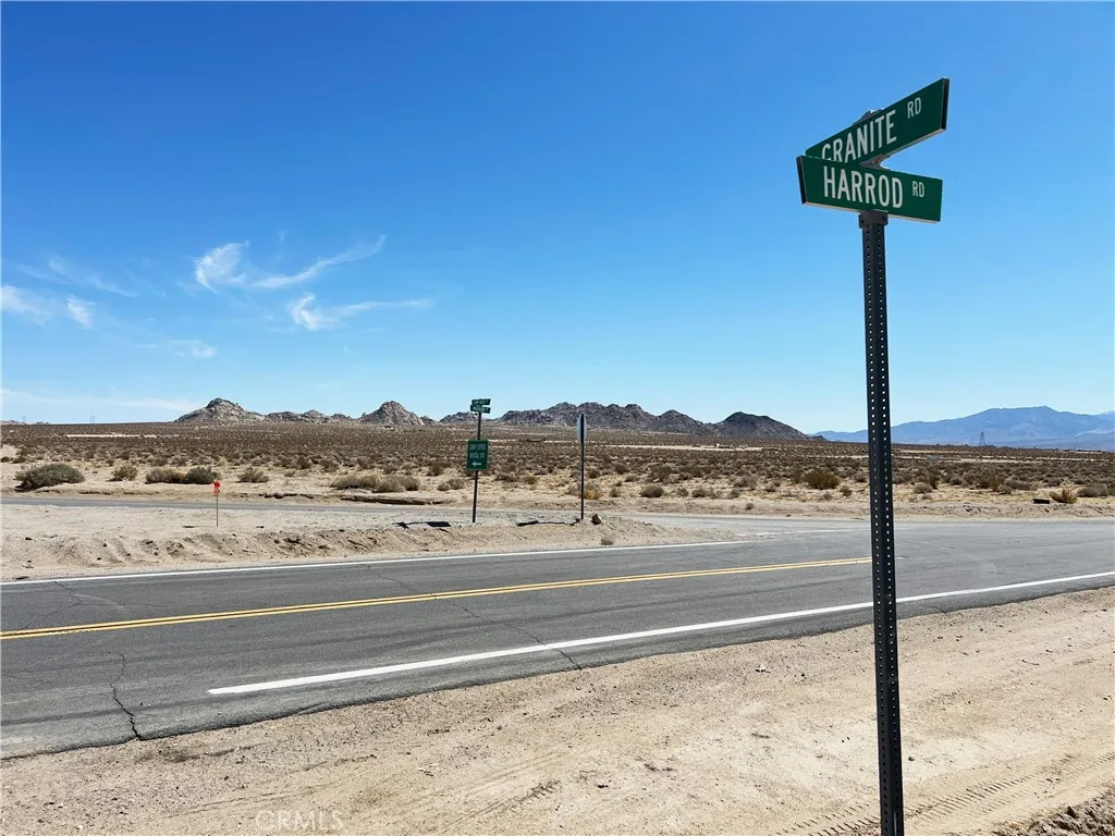 a view of a road with a ocean view