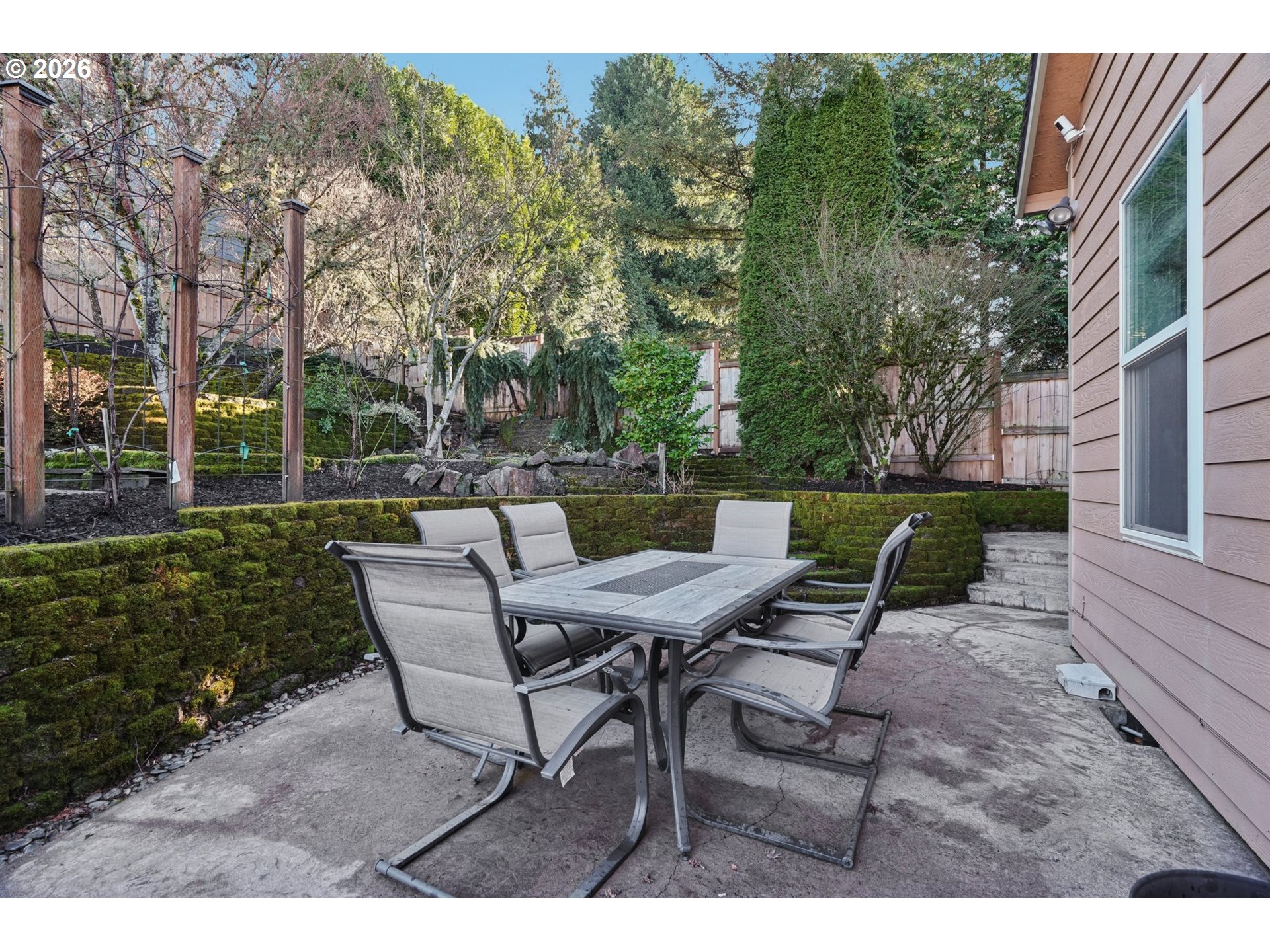 13728 Southwest 159th Terrace Portland, OR 97224 - Photo 35 of 48 a view of a chairs and table in backyard of the house