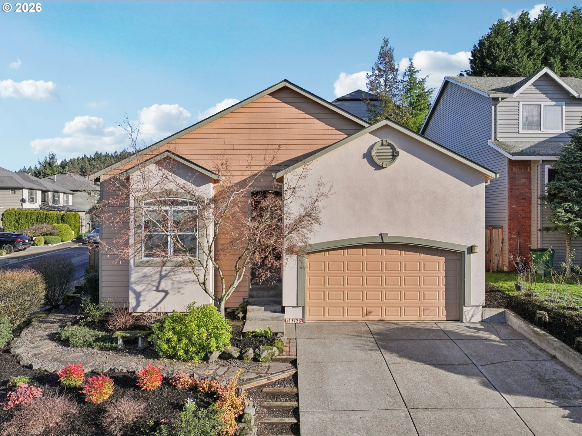 13728 Southwest 159th Terrace Portland, OR 97224 - Photo 41 of 48 a front view of a house with a yard