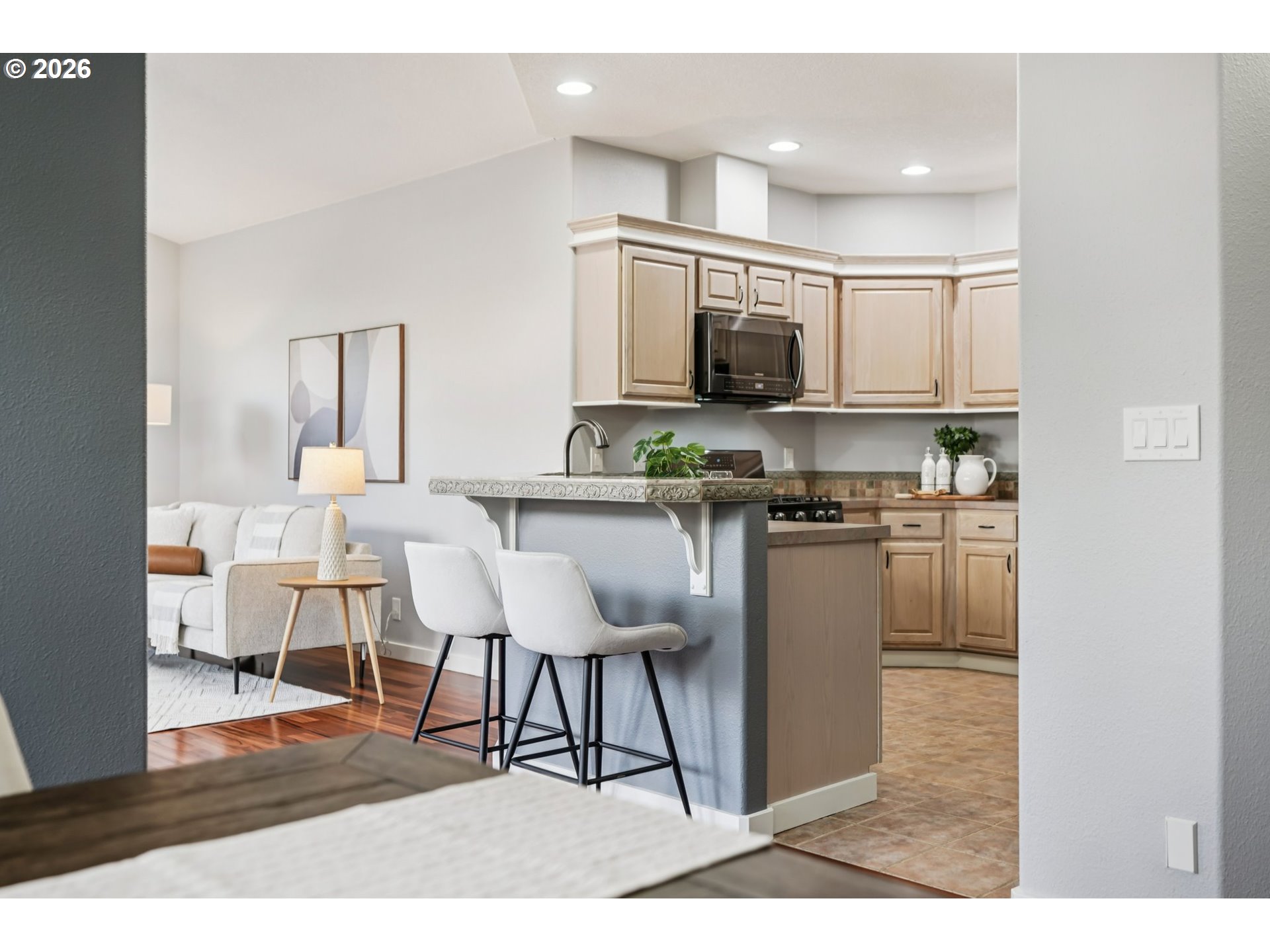 13728 Southwest 159th Terrace Portland, OR 97224 - Photo 8 of 48 a kitchen with stainless steel appliances kitchen island granite countertop a sink and cabinets