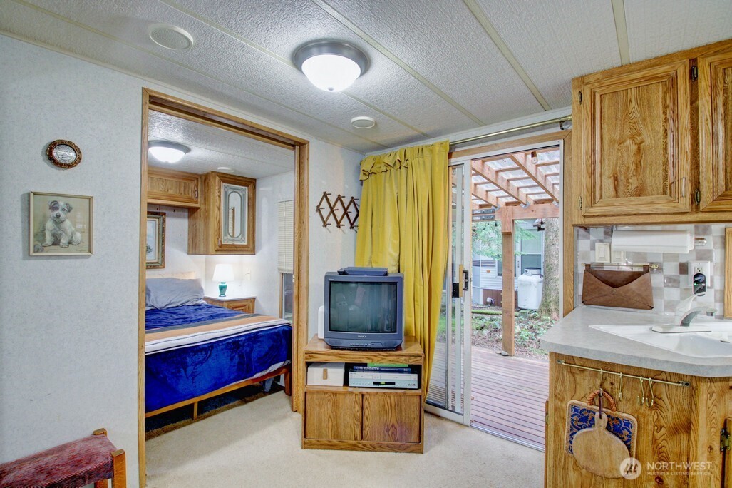 22 Wilderness Way Maple Falls, WA 98266 - Photo 18 of 40 a bedroom with furniture and a window