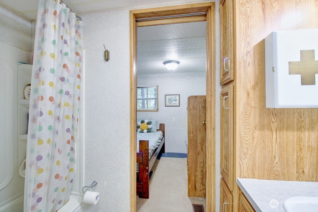 22 Wilderness Way Maple Falls, WA 98266 - Photo 24 of 40 a view of a bedroom from a hallway
