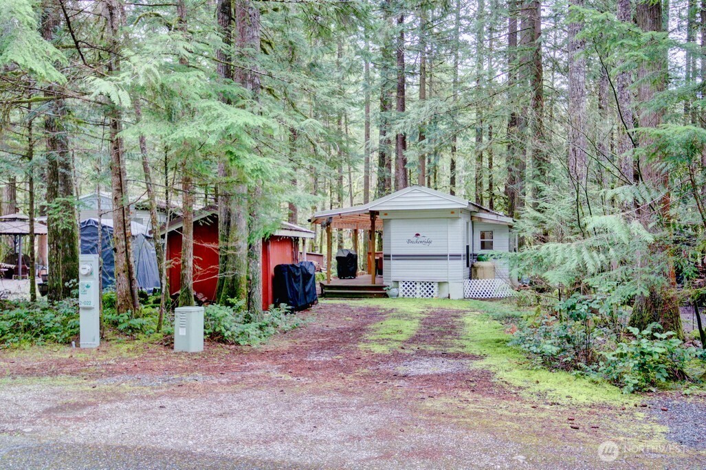 22 Wilderness Way Maple Falls, WA 98266 - Photo 5 of 40 a front view of a house with garden