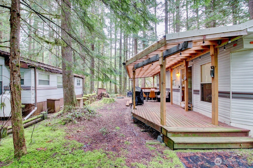 22 Wilderness Way Maple Falls, WA 98266 - Photo 8 of 40 a view of a house with backyard and sitting area