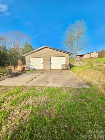 a view of a yard with an outdoor space