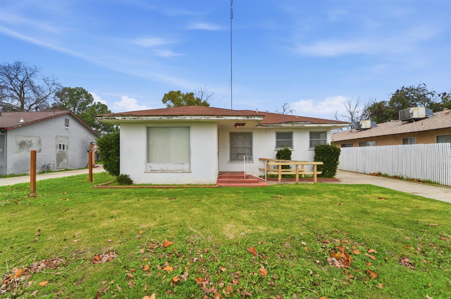 1127 West 19th Street Merced, CA 95340 - Photo 1 of 28 a view of a house with a backyard