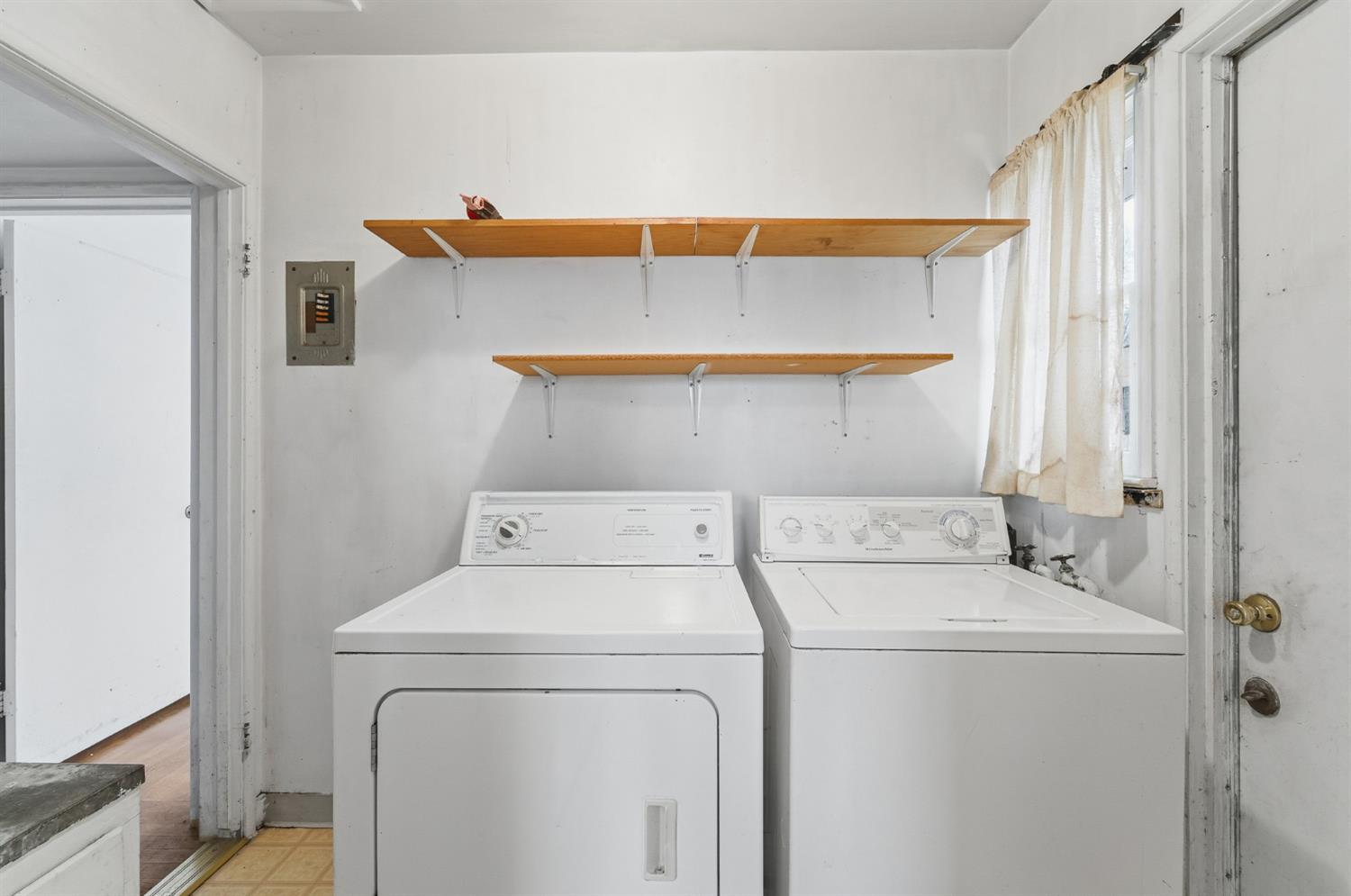1127 West 19th Street Merced, CA 95340 - Photo 14 of 28 a utility room with dryer and washer