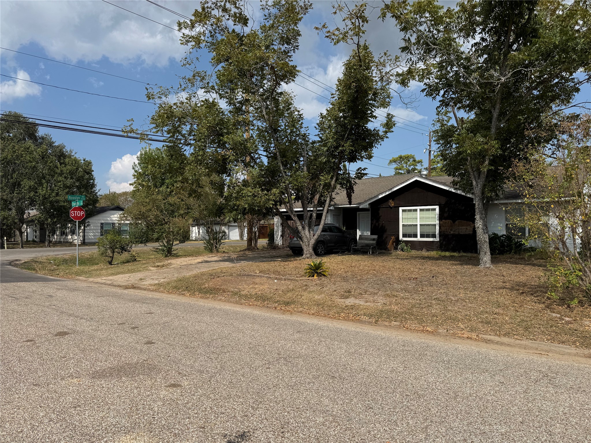 1730 Chantilly Lane Houston, TX 77018 - Photo 2 of 8 a front view of a house with a yard and garage