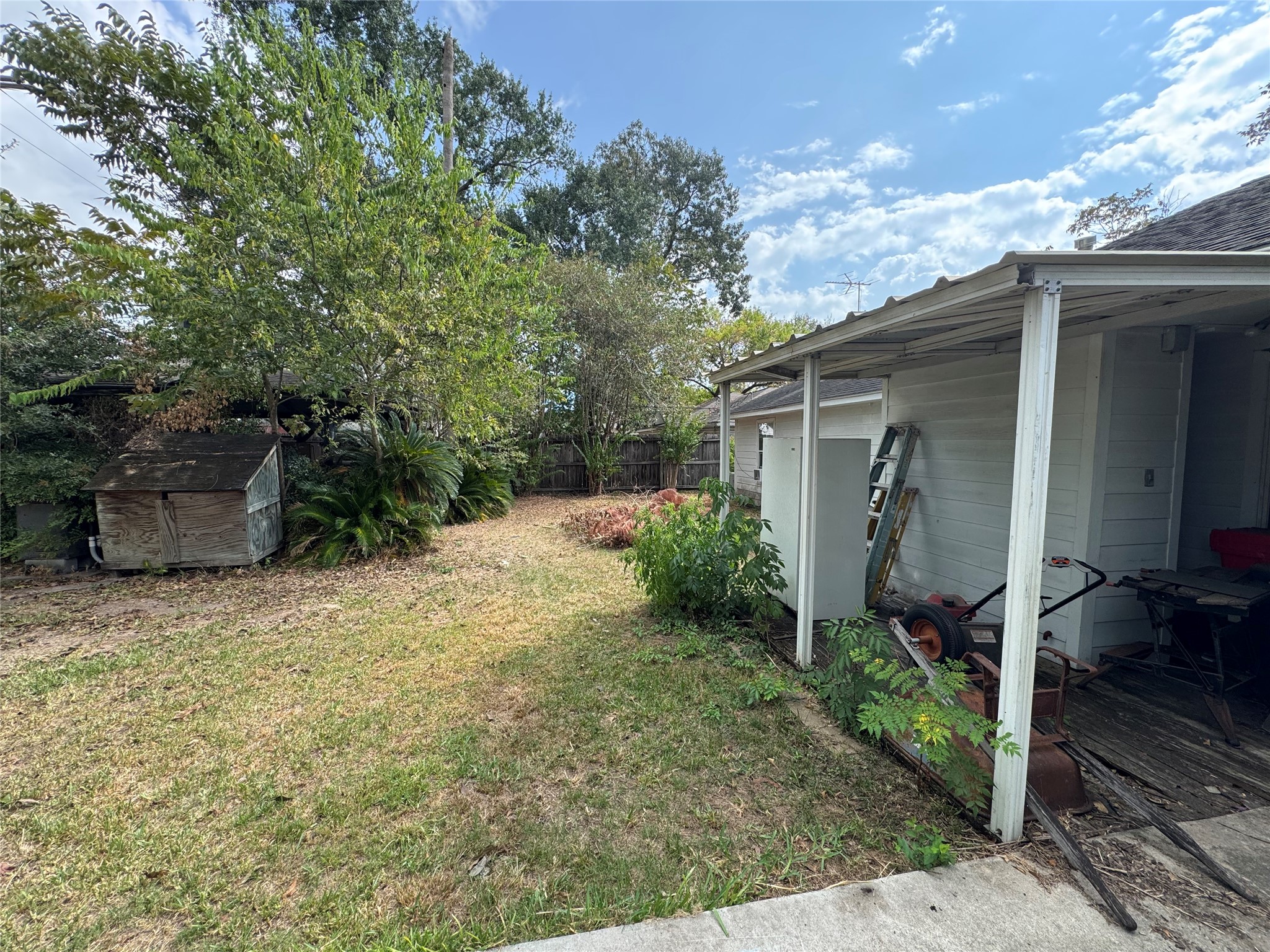 1730 Chantilly Lane Houston, TX 77018 - Photo 4 of 8 a backyard of a house with seating space