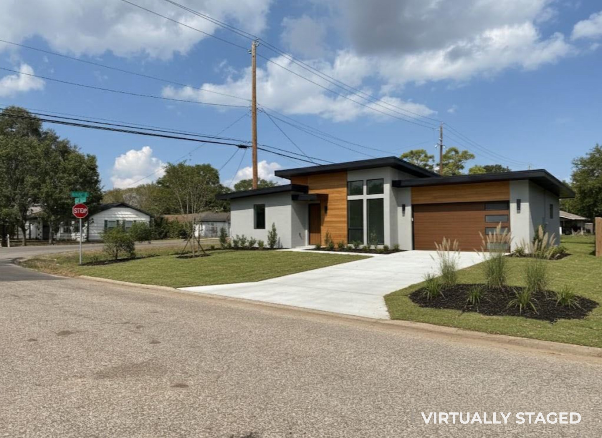 1730 Chantilly Lane Houston, TX 77018 - Photo 8 of 8 a front view of a house with a yard and garage