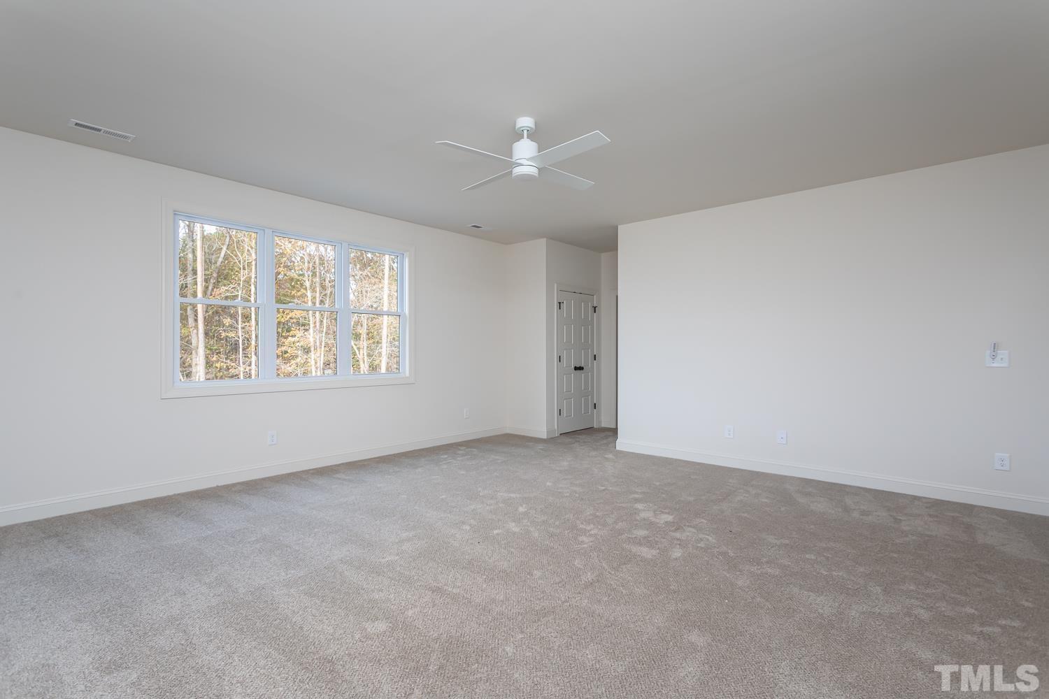 76 Bucchero Lane Clayton, NC 27527 - Photo 22 of 41 an empty room with windows and closet