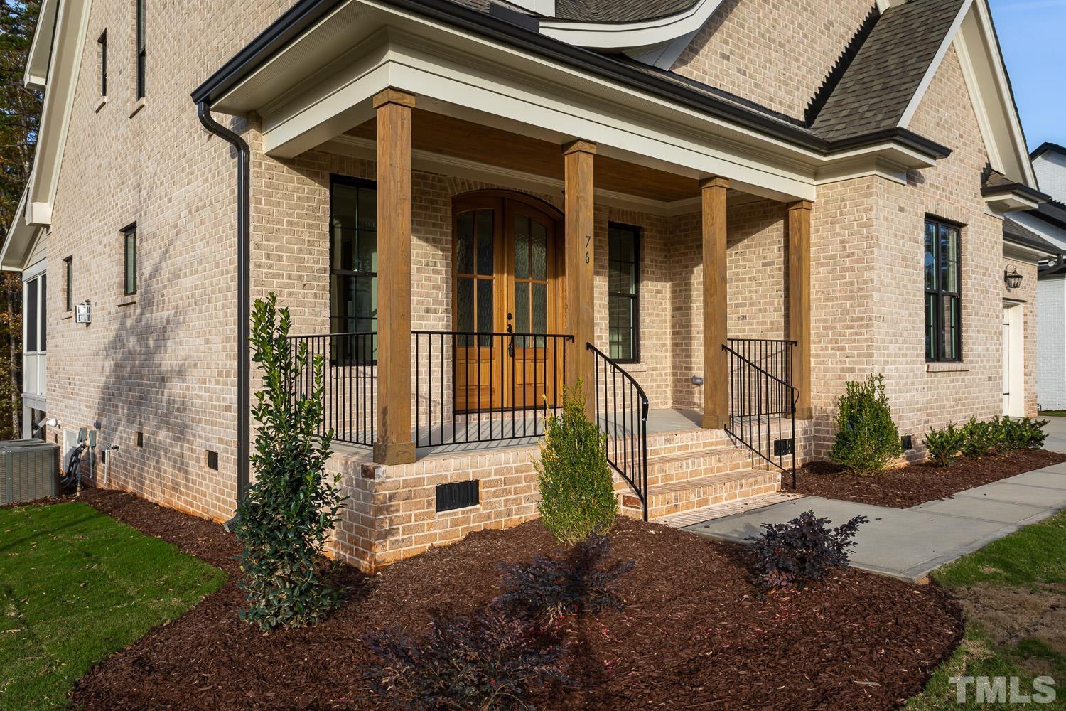76 Bucchero Lane Clayton, NC 27527 - Photo 38 of 41 a view of a house with a small yard