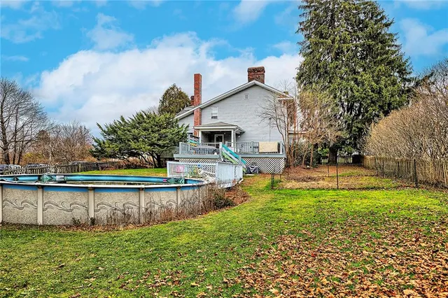 a backyard of a house with lots of green space