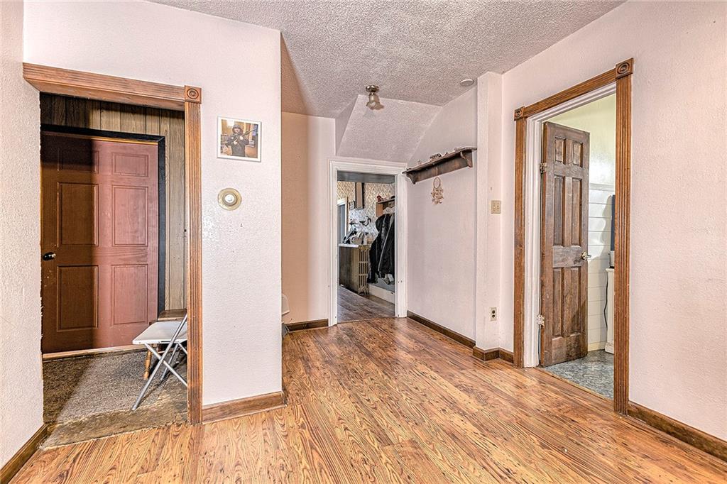 1190 Old Rte 119 Highway North Indiana, PA 15701 - Photo 5 of 36 Back Hall looking from office towards the front, kitchen is off to the right