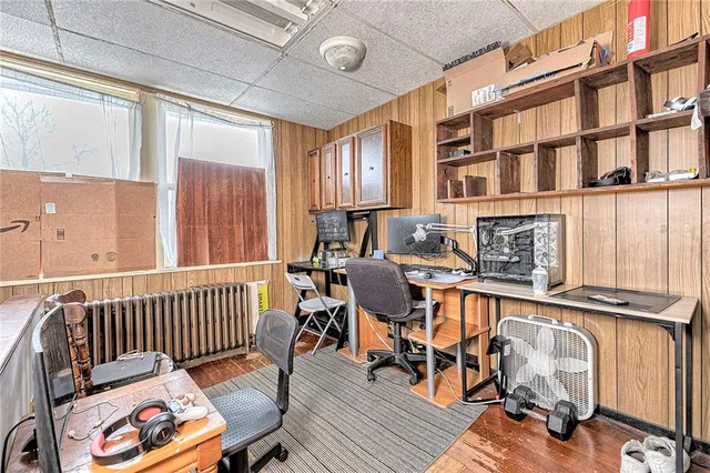 a view of a workspace with furniture