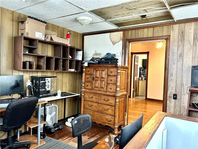 a kitchen with a stove a sink and a refrigerator