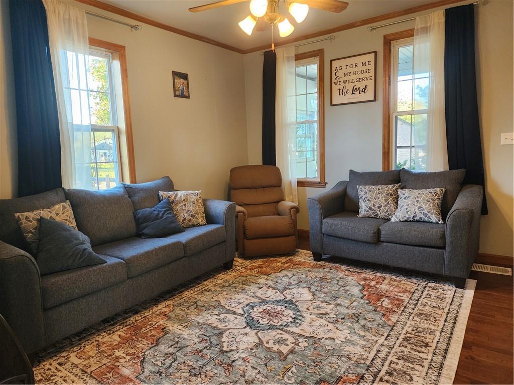 709 North 7th Street Apollo, PA 15613 - Photo 11 of 50 a living room with furniture and a window